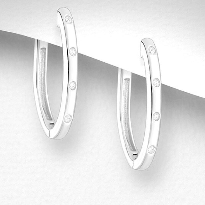 Platinum Zircon Sterling Silver Oval Hoop Earrings